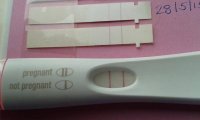 I'm pregnant 15dpo smileyface.jpg