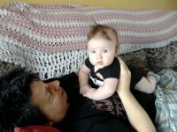 Tummy time with dad 2 August 2010.jpg