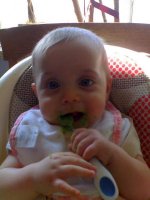 Feeding herself peas.jpg