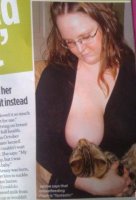 Woman_Breastfeeds_Her_Cat_1.jpg