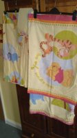 winnie pooh bedding and curtains.jpg