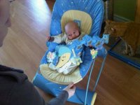 Kieran in bouncy chair.jpg