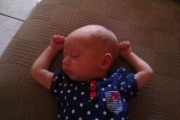 Angelyca showing off her muscles.jpg