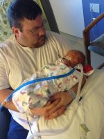 Daddy's first hold.jpg