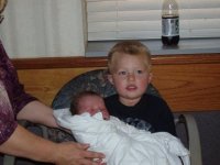 joshua holding jamie firs time.jpg