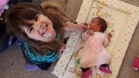 Amara looking after Sienna.jpg